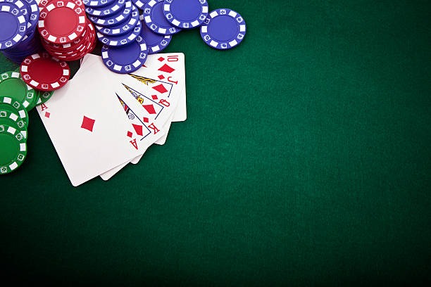 Caribbean Stud Poker table with dealer and cards
